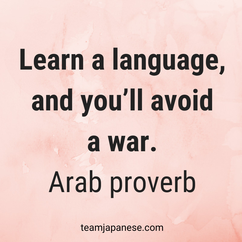 Text on a pink background reads: "Learn a language, and you'll avoid a war. Arab proverb." Discover more inspirational quotes about language learning at teamjapanese.com.
