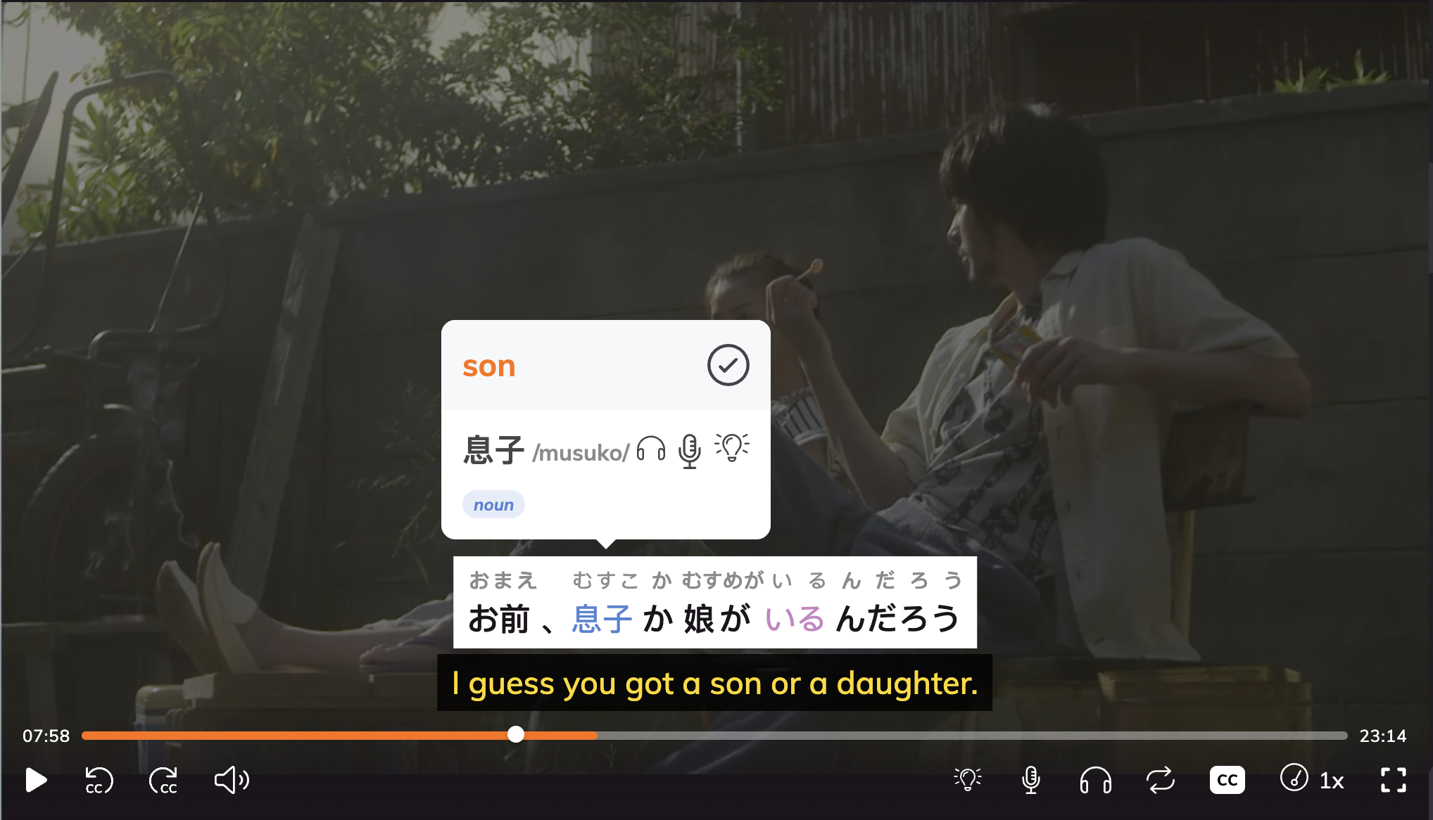 Screenshot of the Lingopie platform, streaming a Japanese drama. Two people sit outdoors on a bench. Onscreen text defines “son” in English and Japanese, with subtitles reading, “I guess you got a son or a daughter.” Media player controls are visible.
