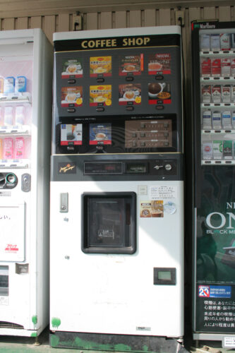 hot drinks vending machine in japan Onomachi_Station_31 A Japanese vending machine with a selection of hot drinks, including various coffee drinks, cocoa and corn soup.